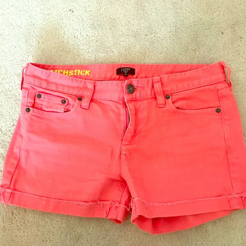 Coral J Crew distressed denim shorts
